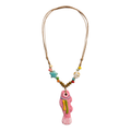 Pastel pink fish pendant bohemian rope necklace with colorful beads, starfish, seashell details, and brown cord by Browniecherry
