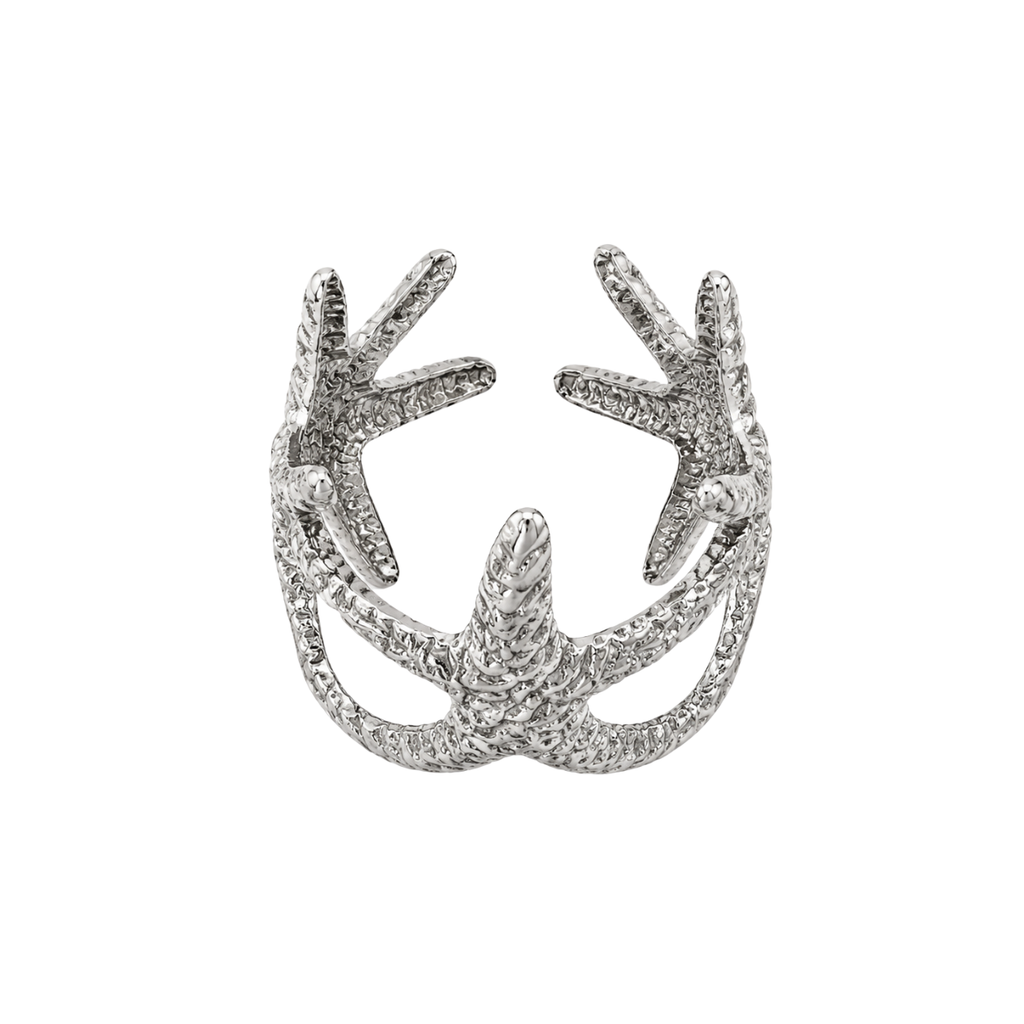 Silver adjustable statement ring with three textured starfish, layered curved bands, and raised ocean-inspired details by Browniecherry
