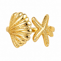 Gold adjustable statement ring with sculpted seashell and starfish ends, raised ridges, and textured details by Browniecherry
