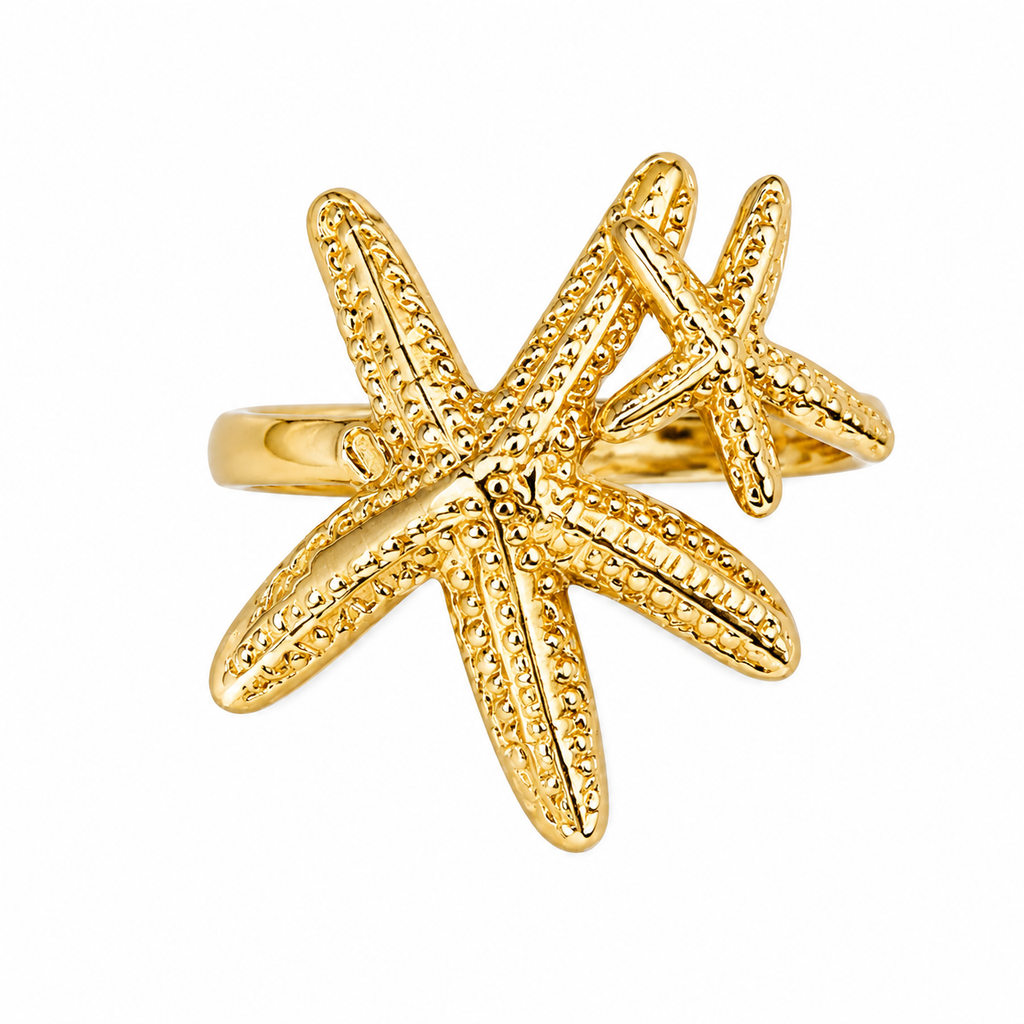 Gold adjustable statement ring with one large and one small textured starfish in a layered coastal design by Browniecherry