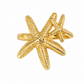 Gold adjustable statement ring with one large and one small textured starfish in a layered coastal design by Browniecherry