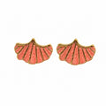 Gold-tone fan shell stud earrings with coral pink enamel, tropical coastal statement jewelry for women