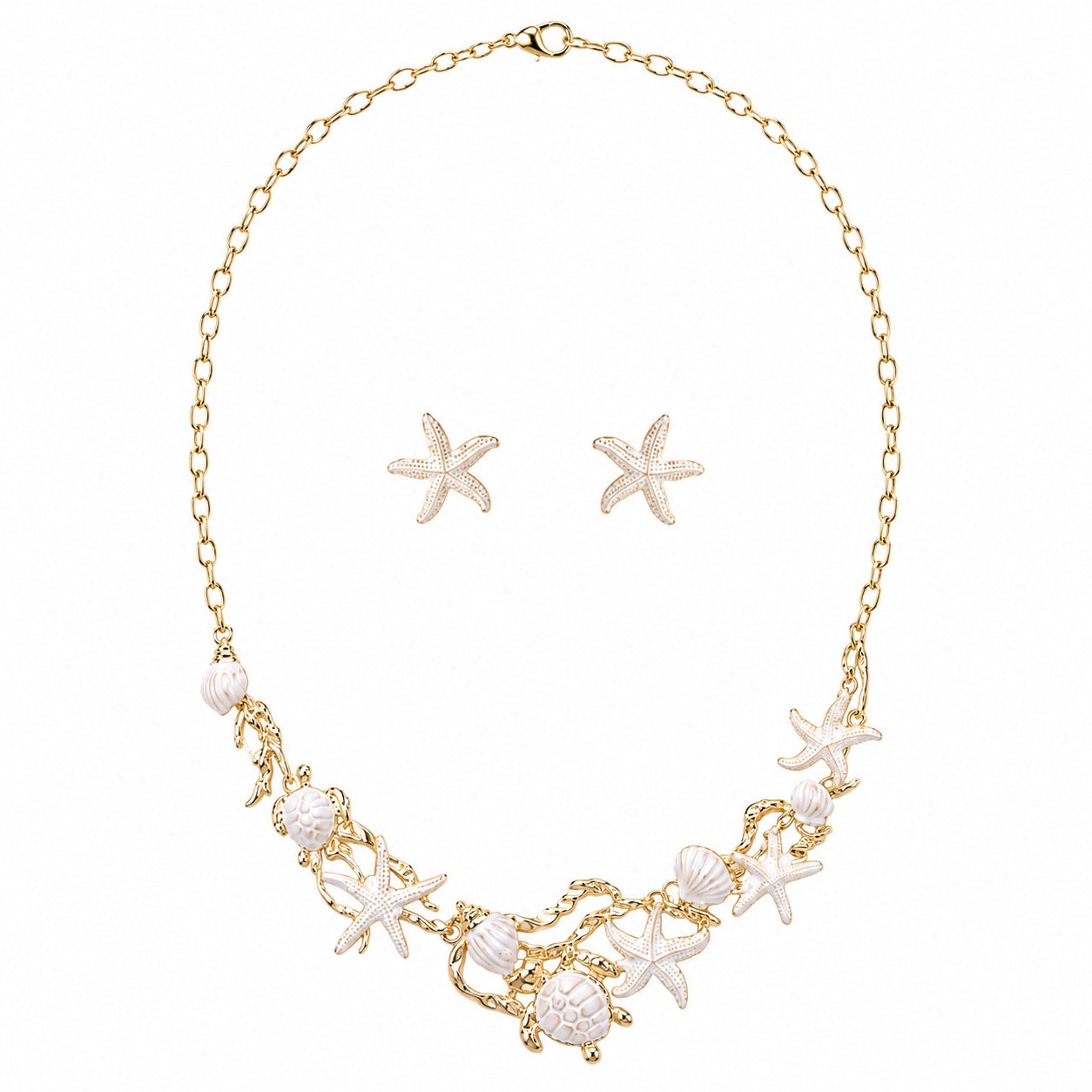 White ocean charm necklace and starfish earring set with faux pearls and gold-tone details by Browniecherry
