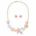 Pastel multicolor starfish and seashell necklace and earring set with faux pearls and gold-tone details by Browniecherry
