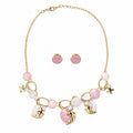 Pastel pink and pearl white seashell necklace and earring set with starfish, faux pearls, and gold-tone details by Browniecherry
