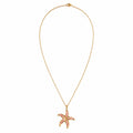 Pastel pink glossy starfish pendant necklace with raised gold-tone details and slim adjustable chain by Browniecherry
