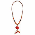 Sunset red seashell pendant bohemian rope necklace with hanging beads, warm colorful accents, and dark brown cord by Browniecherry
