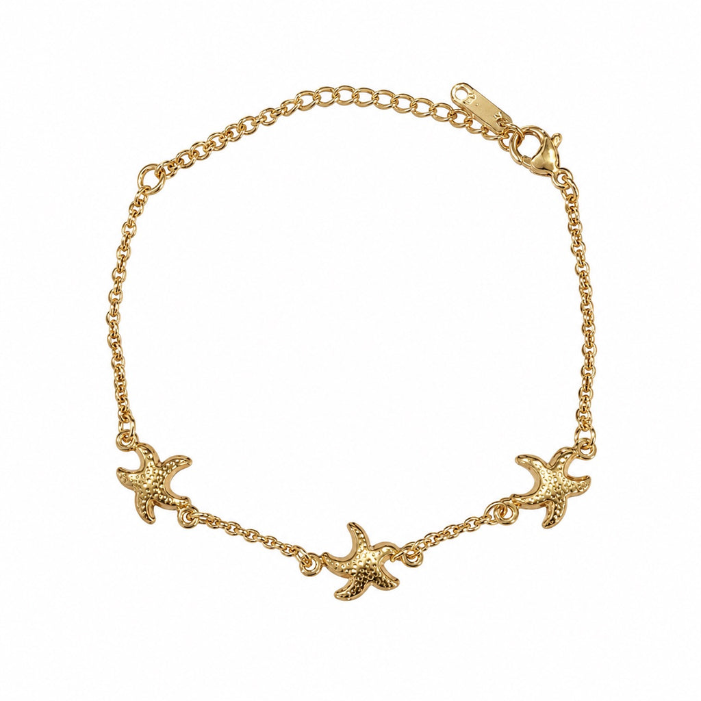 Gold adjustable bracelet with three raised starfish charms, slim chain, and lobster clasp by Browniecherry
